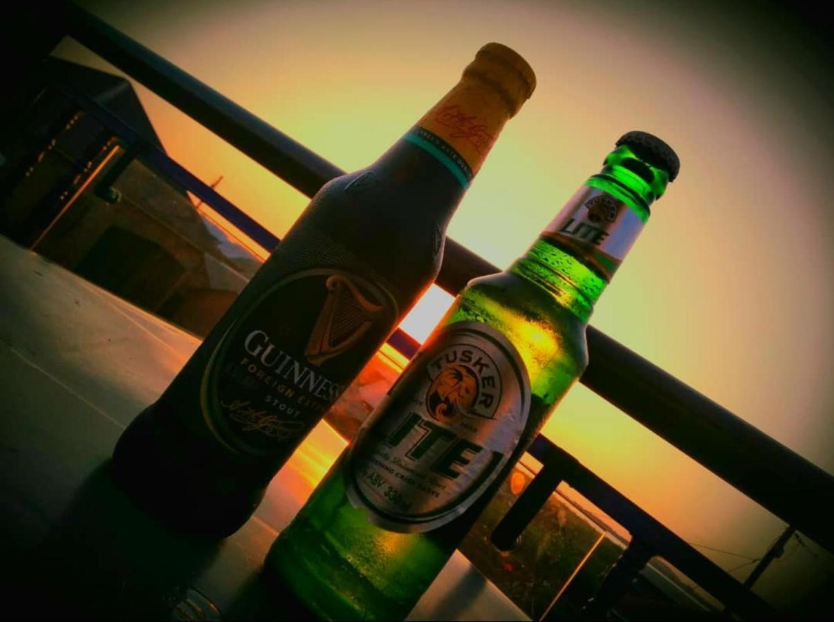 Migingo Suites Entebbe Esterno foto
